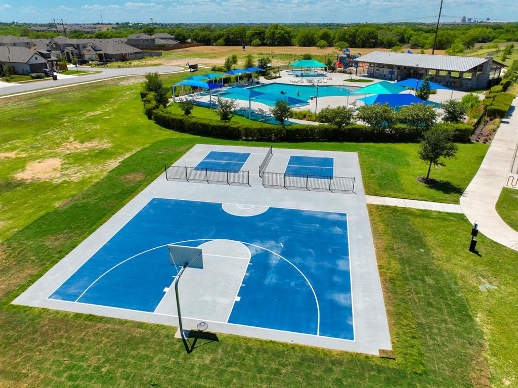 231 Windswept Way Kyle, TX 78640 - Photo 35 of 39 a view of an outdoor space pool patio and lake view