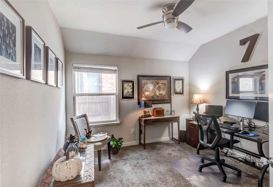 231 Windswept Way Kyle, TX 78640 - Photo 9 of 39 a living room with furniture and a window