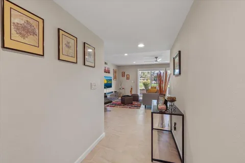 a kitchen with stainless steel appliances kitchen island granite countertop a stove and cabinets