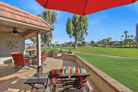 a front view of a house with lake view