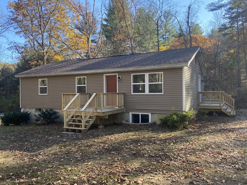 129 Greenwich Road Ware, MA 01082 - Photo 1 of 31 a house view with a backyard space