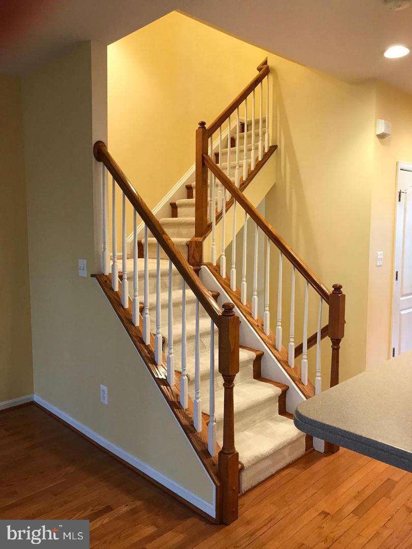 21927 Windy Oaks Square Broadlands, VA 20148 - Photo 5 of 18 a view of entryway with wooden floor