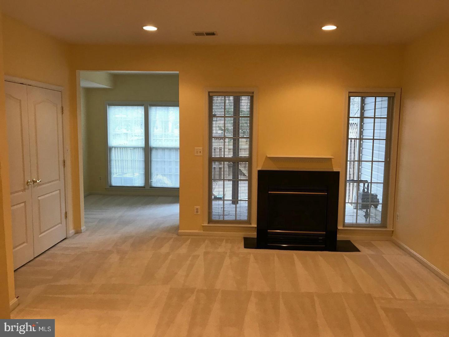21927 Windy Oaks Square Broadlands, VA 20148 - Photo 8 of 18 a view of an empty room with a cabinet and workspace