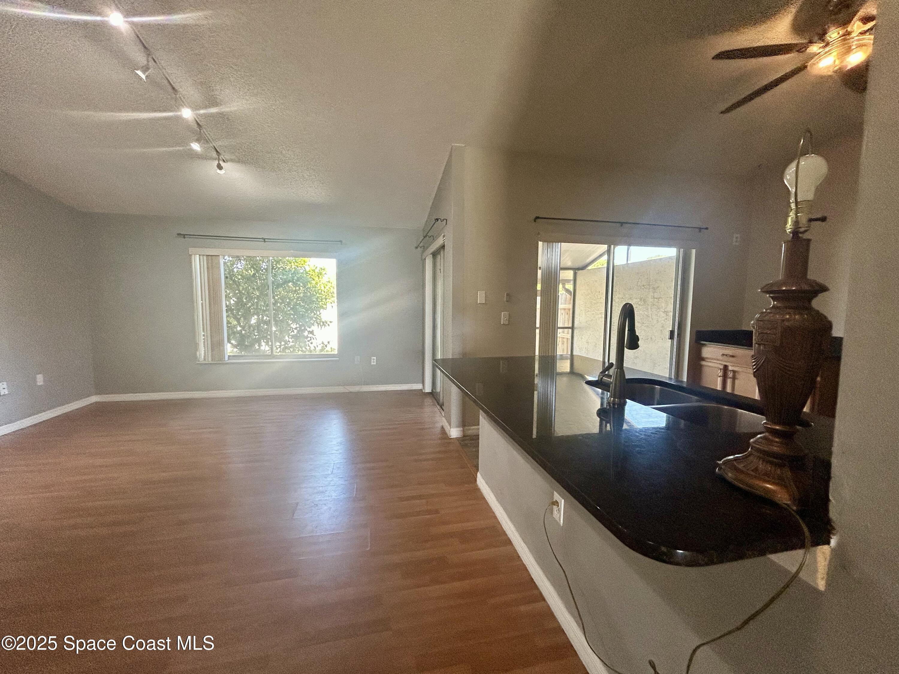 834 Barbados Avenue Melbourne, FL 32901 - Photo 11 of 12 a view of a living room and dining room
