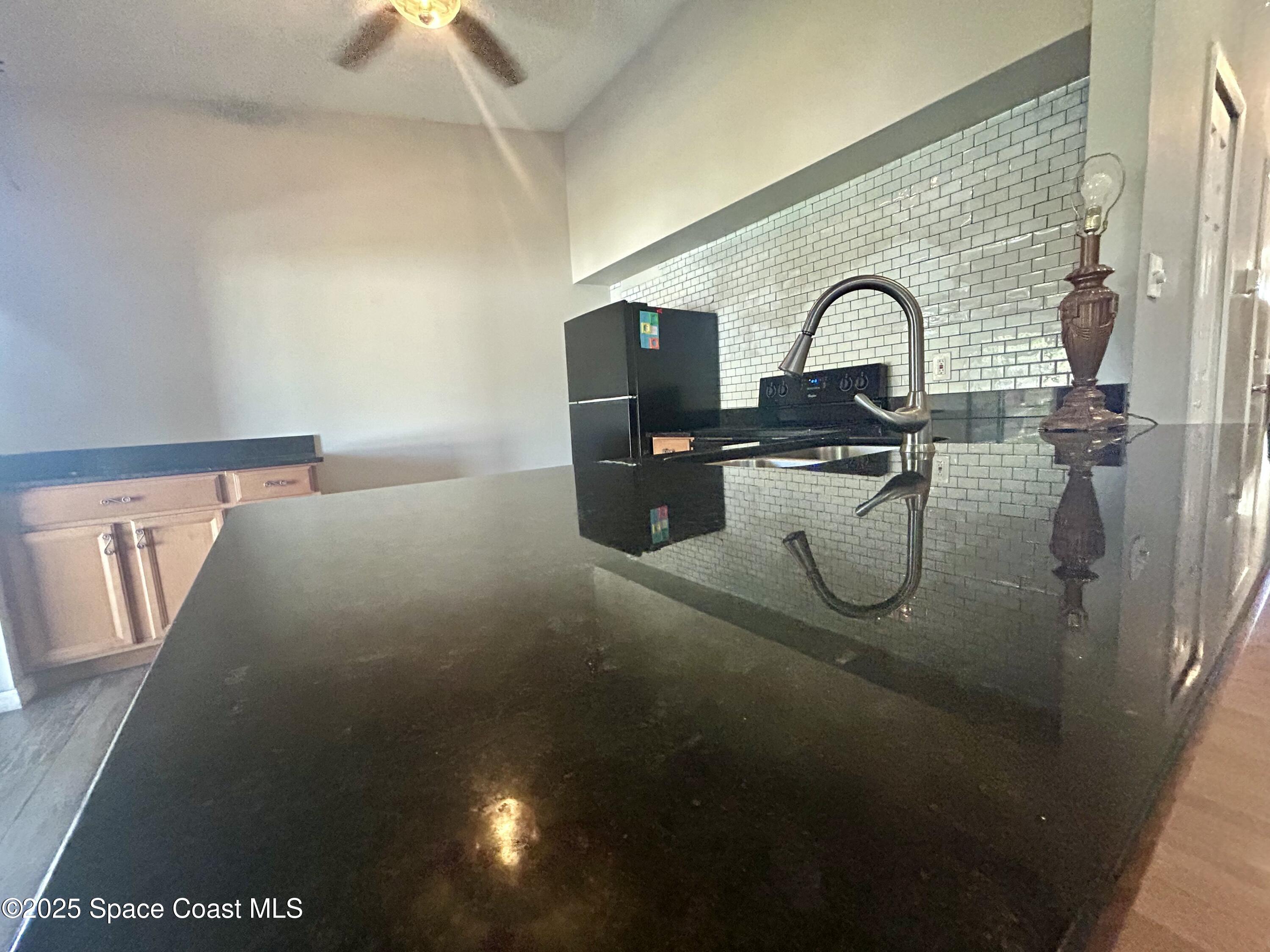 834 Barbados Avenue Melbourne, FL 32901 - Photo 10 of 12 a view of swimming pool from a bathroom