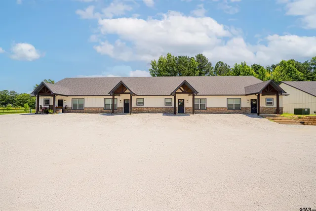 a view of house with front of house