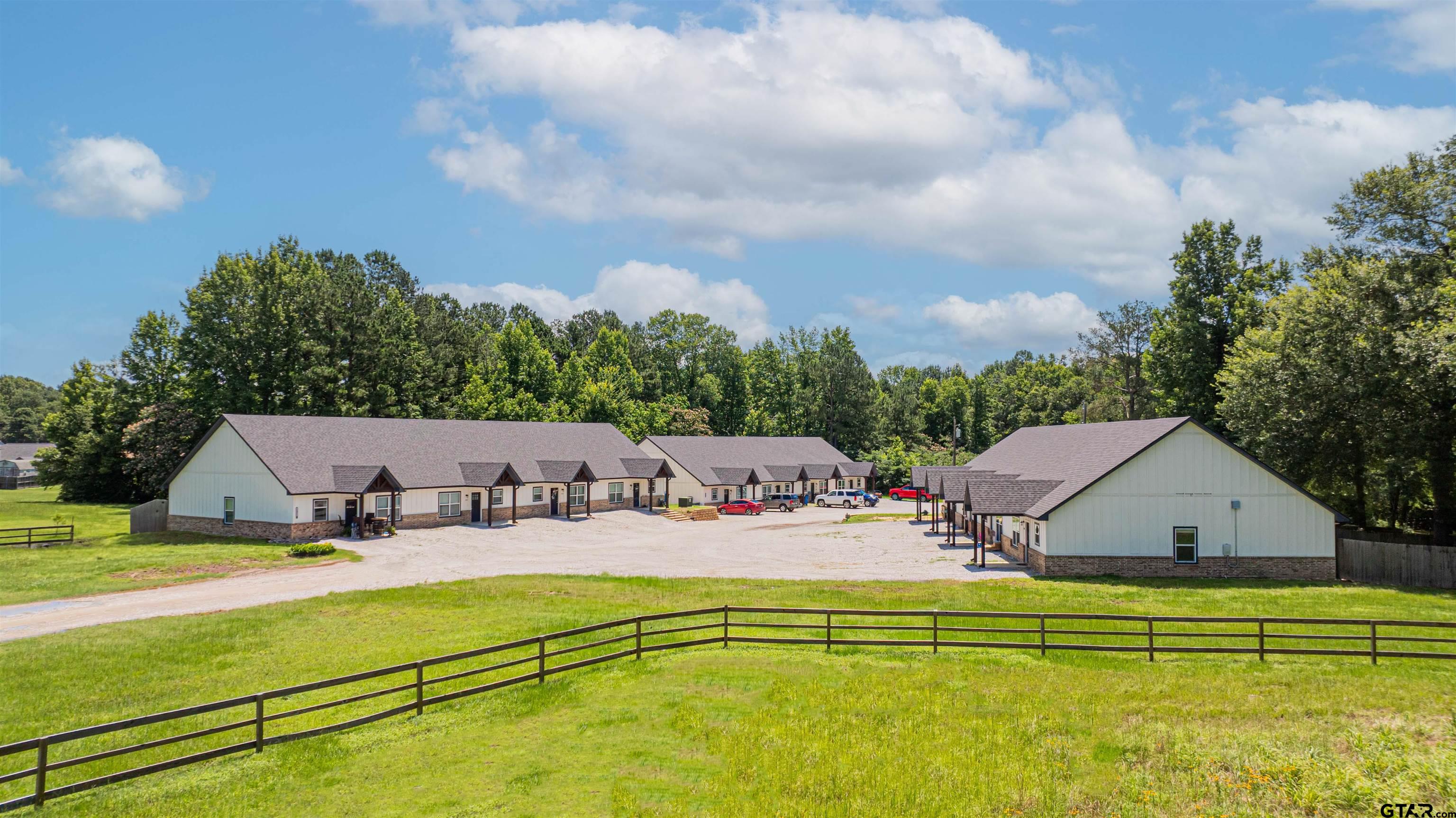 128 Loye Lane Hawkins, TX 75765 - Photo 5 of 25 a view of a swimming pool with a lounge chairs