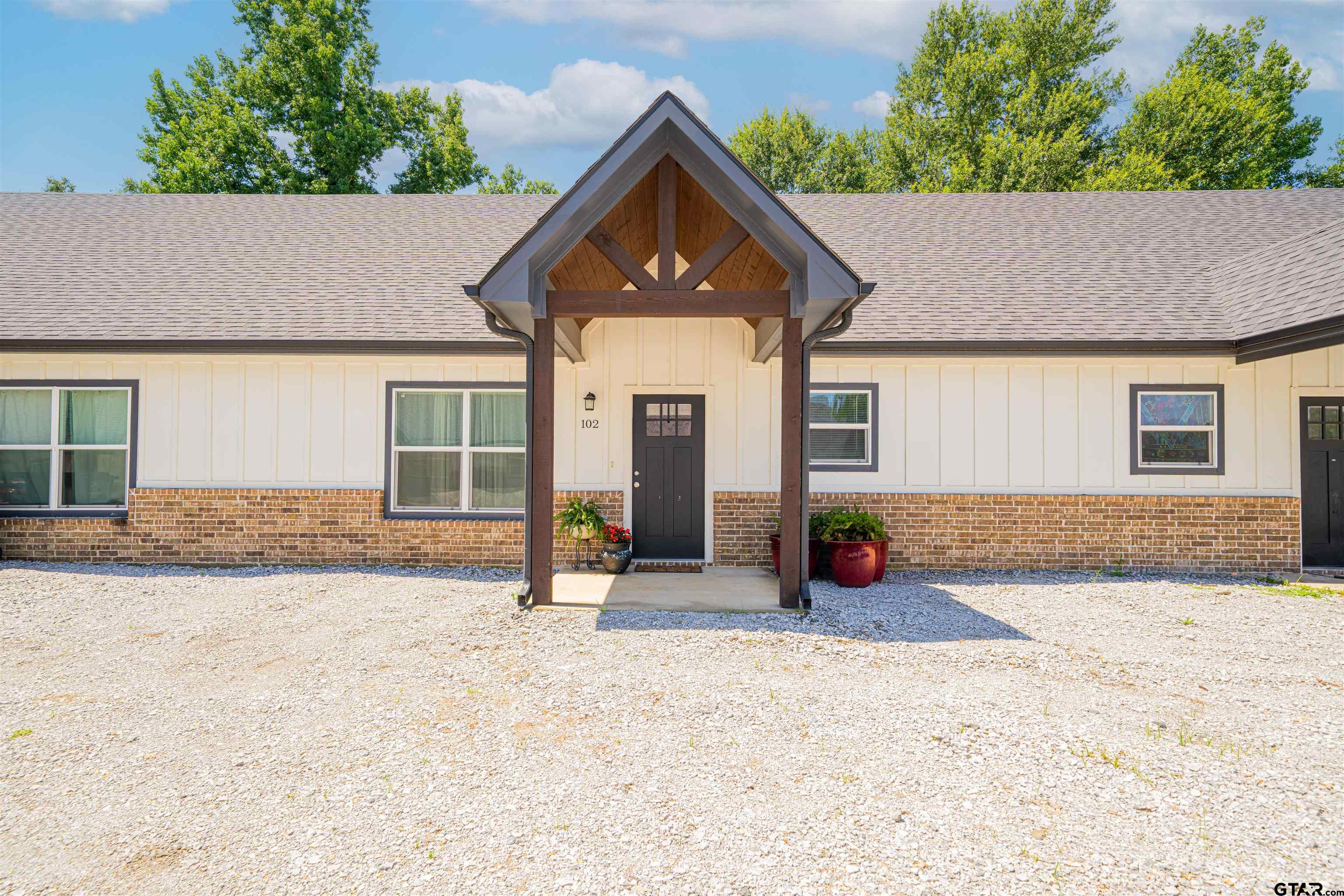 128 Loye Lane Hawkins, TX 75765 - Photo 7 of 25 front view of a house with a patio