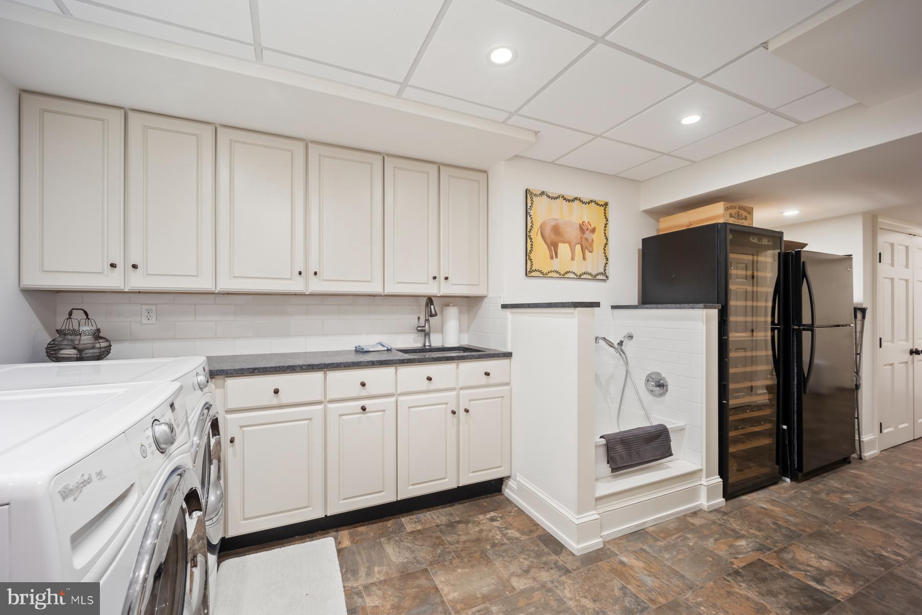 1660 Mt Pleasant Road Villanova, PA 19085 - Photo 26 of 43 a kitchen with granite countertop a refrigerator and a sink