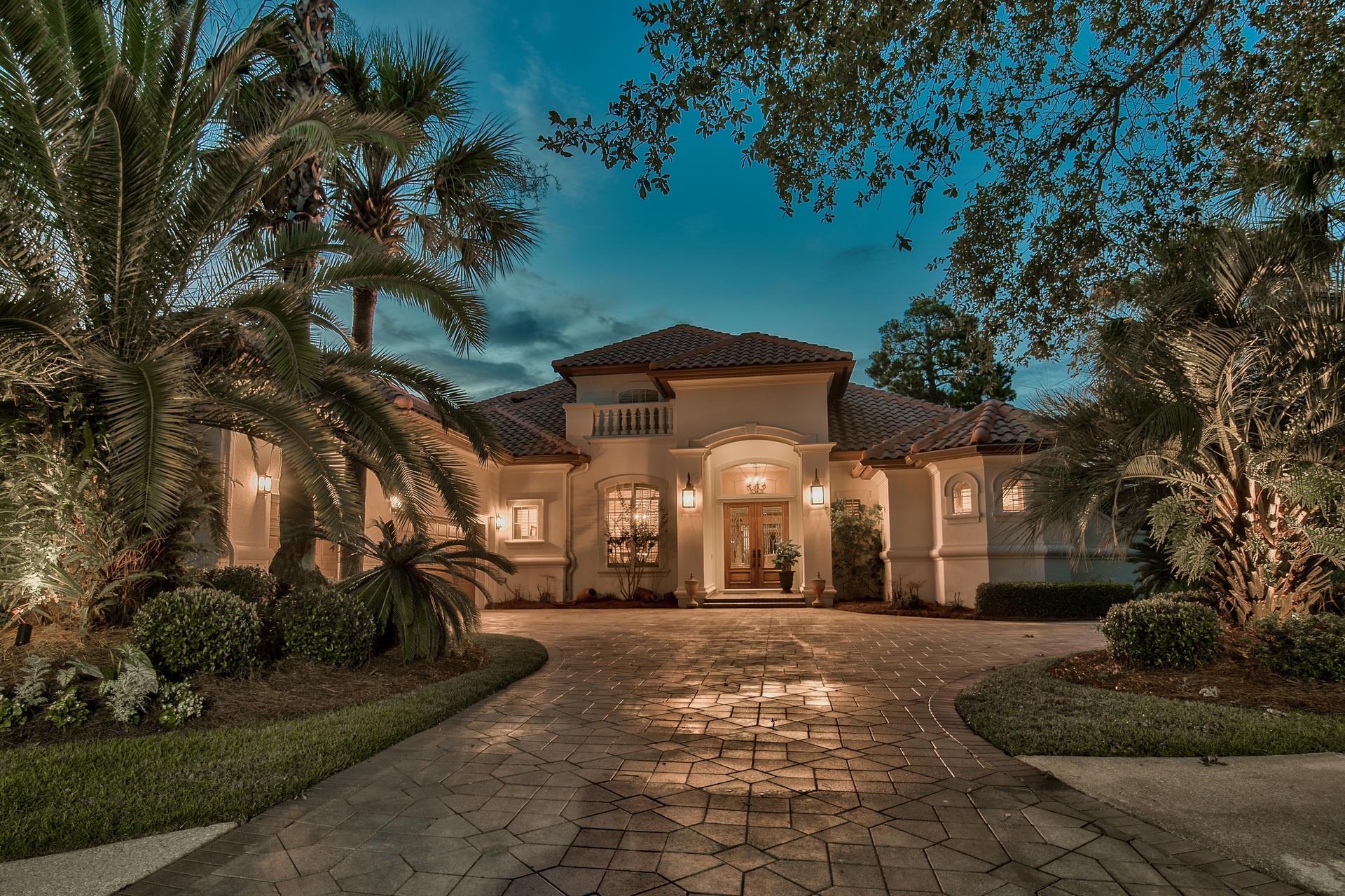 2956 Pine Valley Road Miramar Beach, FL 32550 - Photo 1 of 69 a front view of a building with a yard