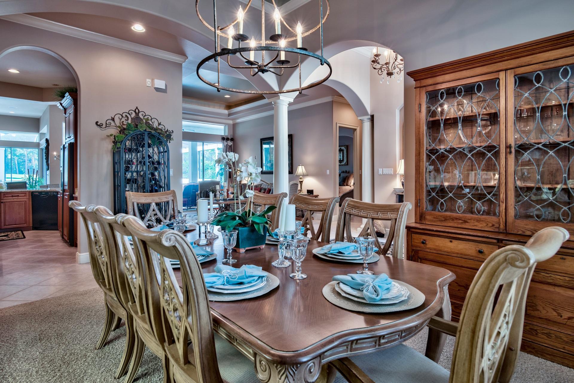 2956 Pine Valley Road Miramar Beach, FL 32550 - Photo 11 of 69 a dining room with furniture a chandelier and wooden floor