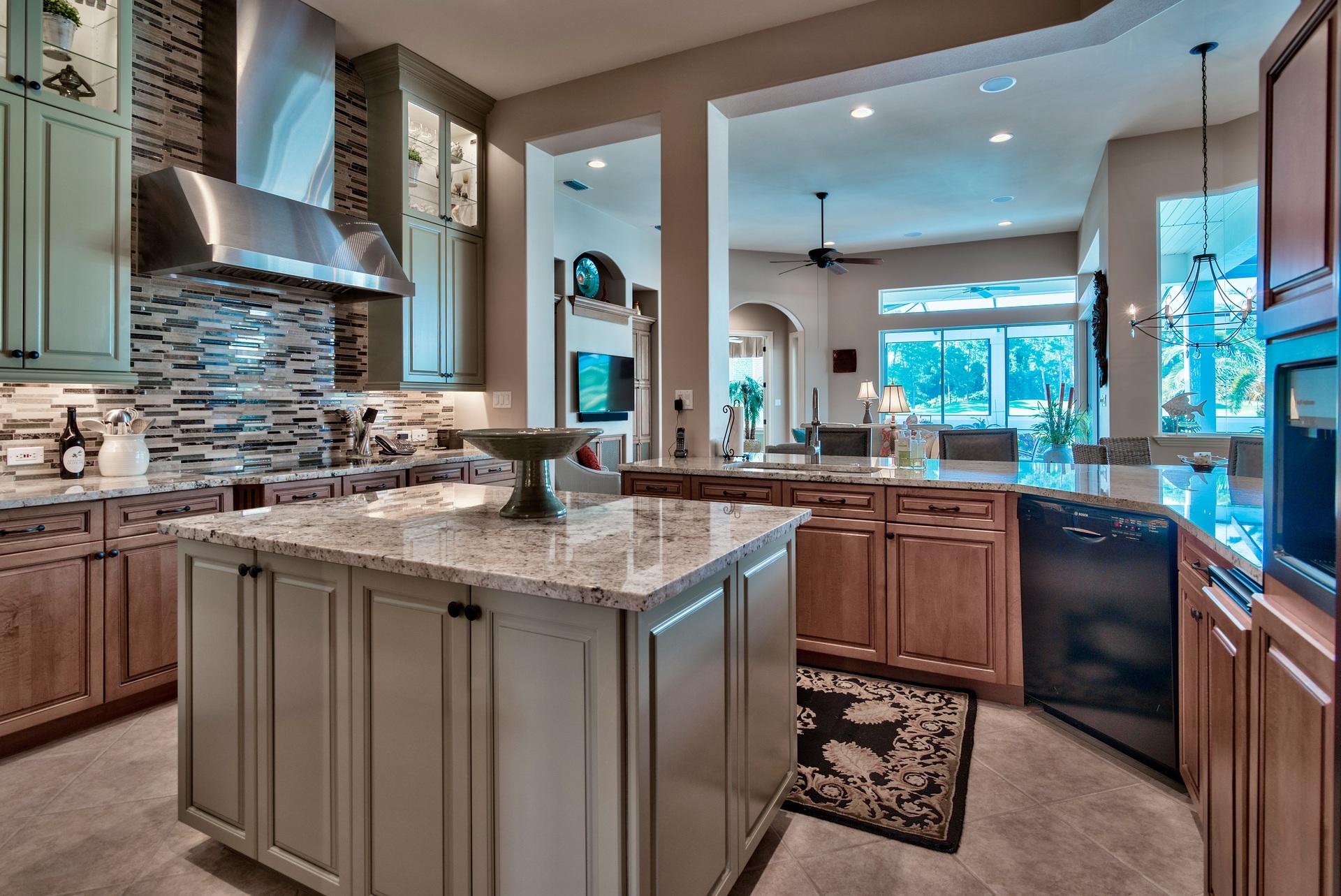 2956 Pine Valley Road Miramar Beach, FL 32550 - Photo 12 of 69 a kitchen with stainless steel appliances granite countertop a sink a stove and a wooden cabinets