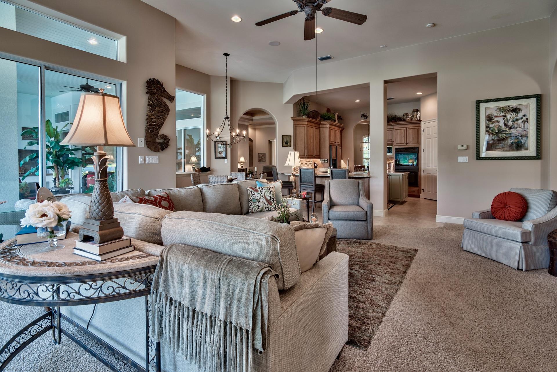 2956 Pine Valley Road Miramar Beach, FL 32550 - Photo 17 of 69 a living room with furniture and a chandelier