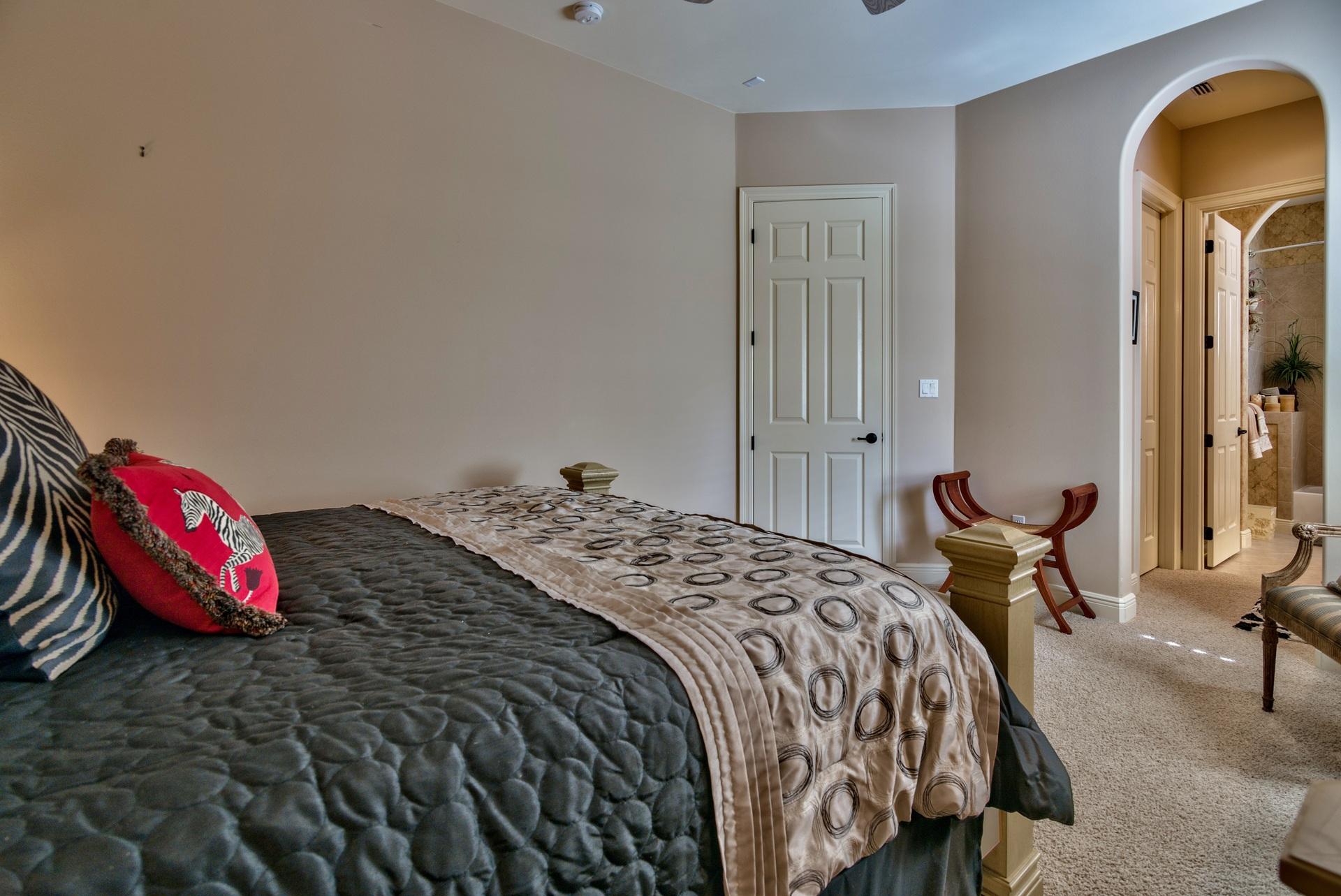 2956 Pine Valley Road Miramar Beach, FL 32550 - Photo 24 of 69 a bedroom with a bed and a table