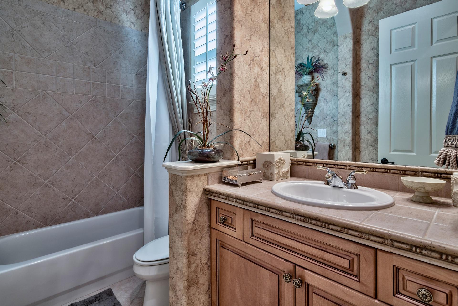 2956 Pine Valley Road Miramar Beach, FL 32550 - Photo 26 of 69 a bathroom with a sink and a mirror