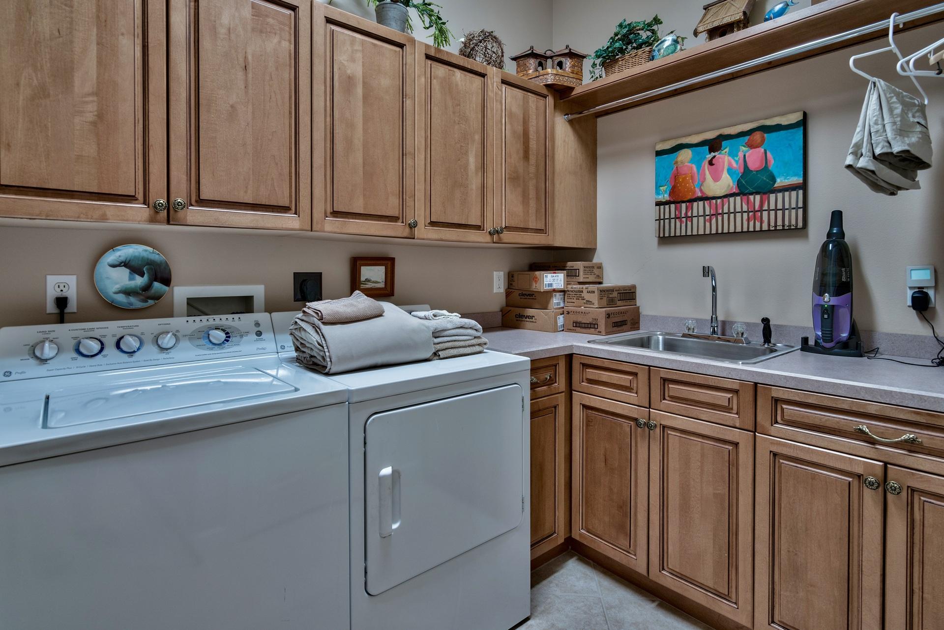 2956 Pine Valley Road Miramar Beach, FL 32550 - Photo 27 of 69 a kitchen with stainless steel appliances granite countertop a sink a stove and cabinets