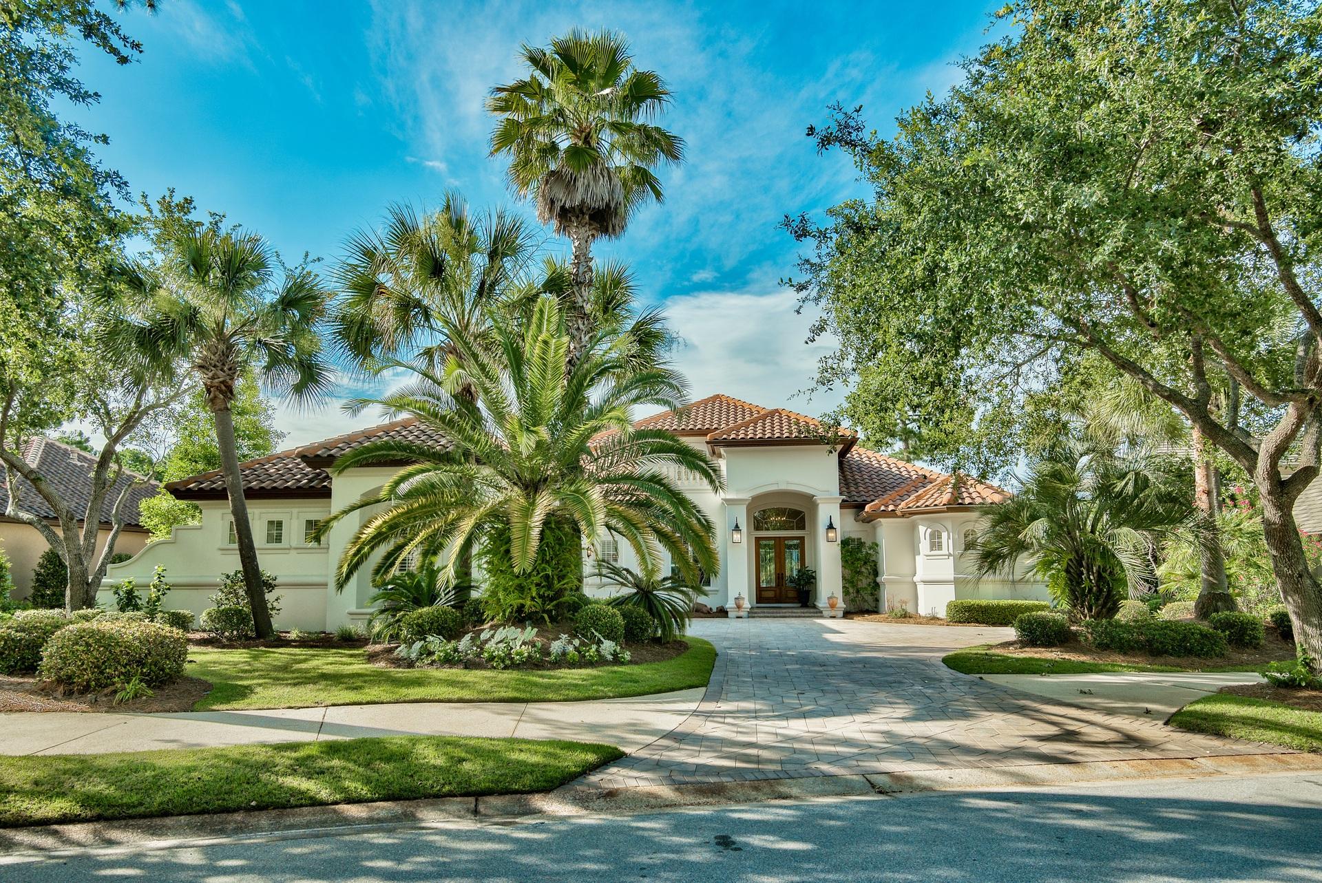 2956 Pine Valley Road Miramar Beach, FL 32550 - Photo 4 of 69 a front view of a house with a yard