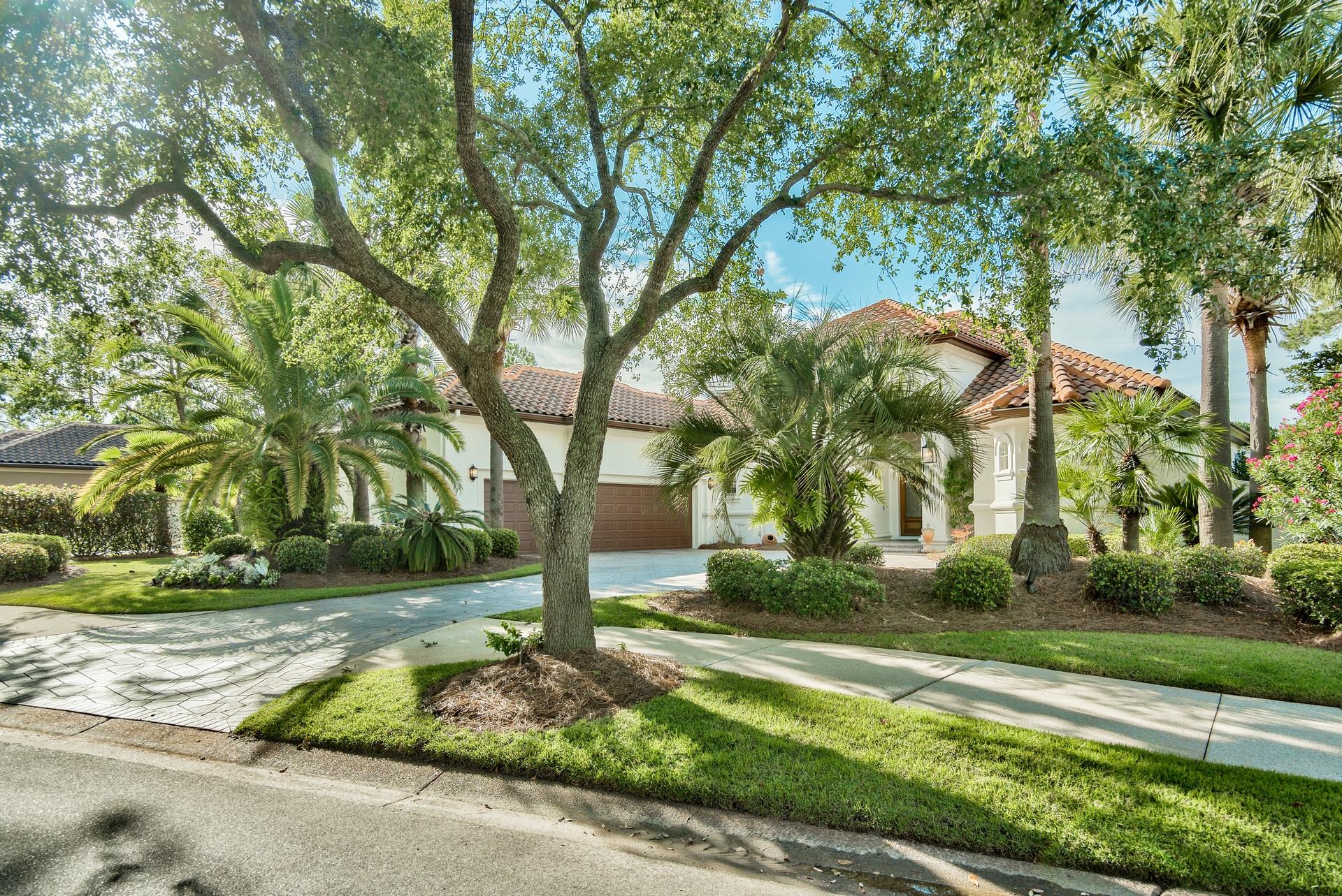 2956 Pine Valley Road Miramar Beach, FL 32550 - Photo 5 of 69 a view of a fountain in front of a tree
