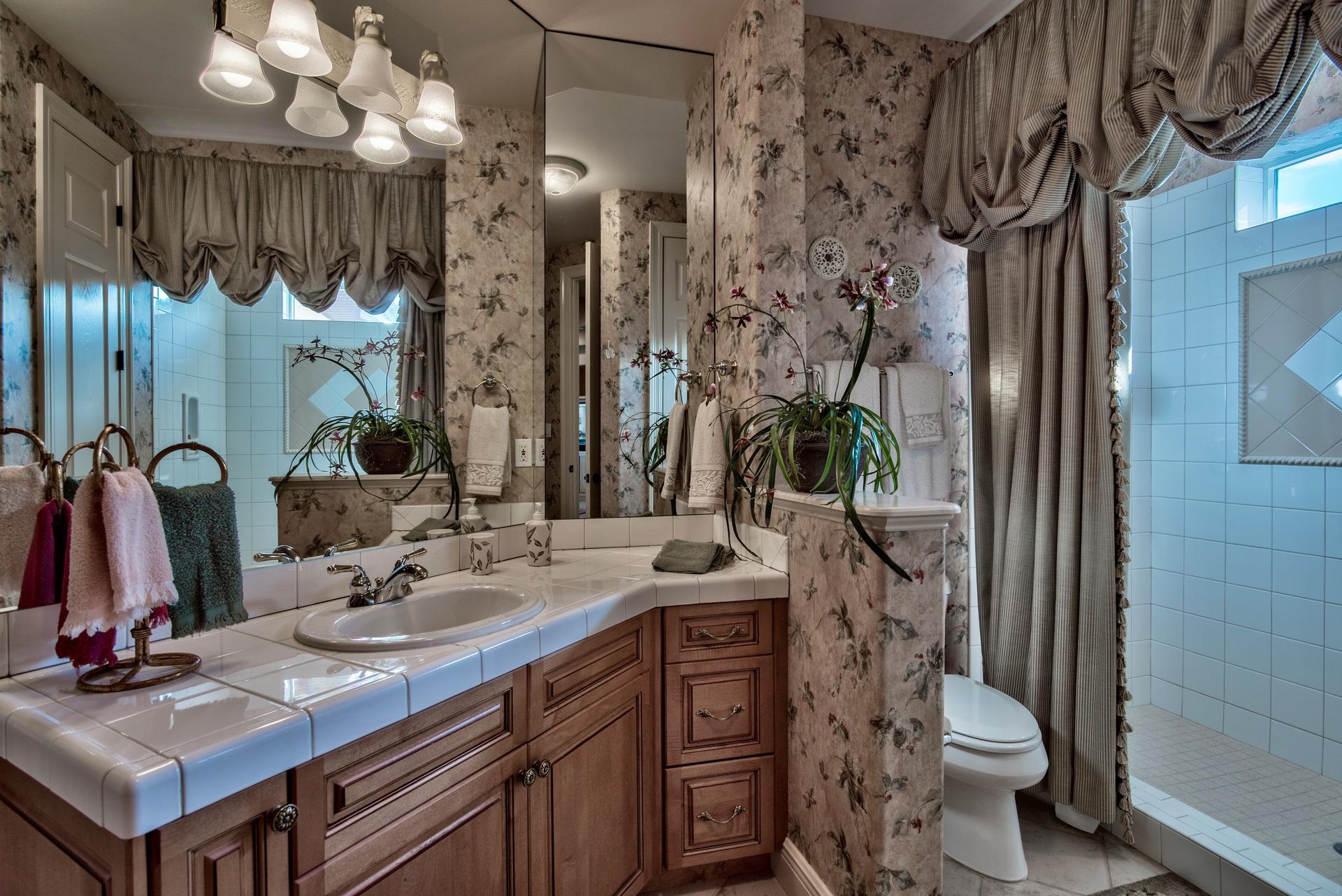 2956 Pine Valley Road Miramar Beach, FL 32550 - Photo 42 of 69 a bathroom with a sink double vanity and a mirror