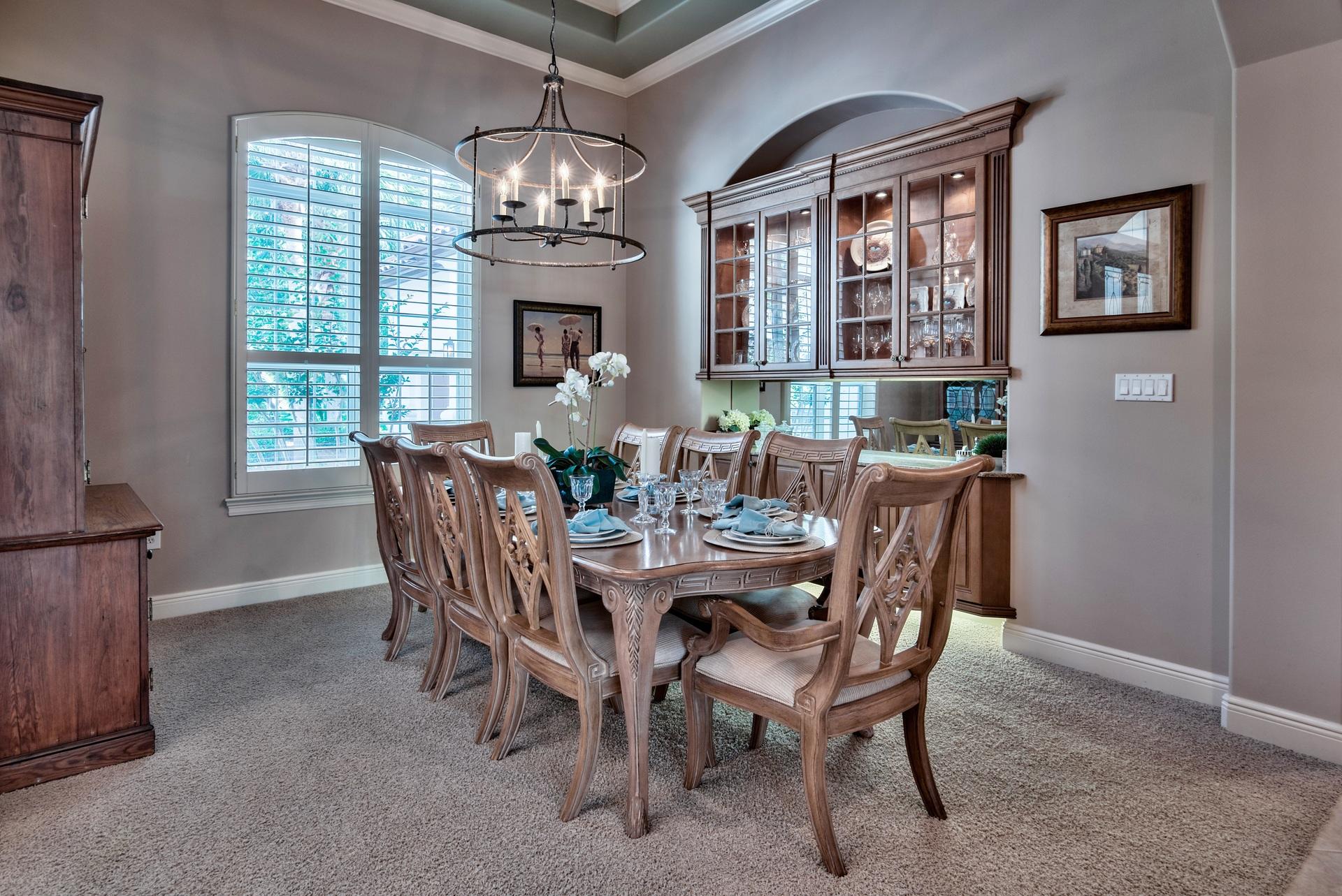 2956 Pine Valley Road Miramar Beach, FL 32550 - Photo 10 of 69 a dining room with furniture a chandelier and window