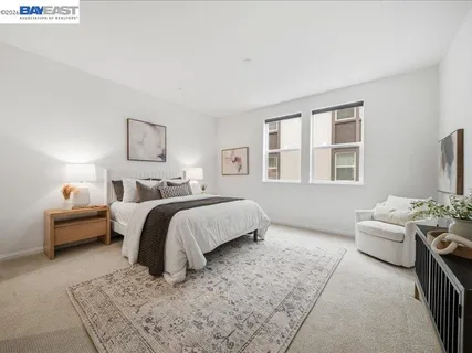 a bedroom with bed and window