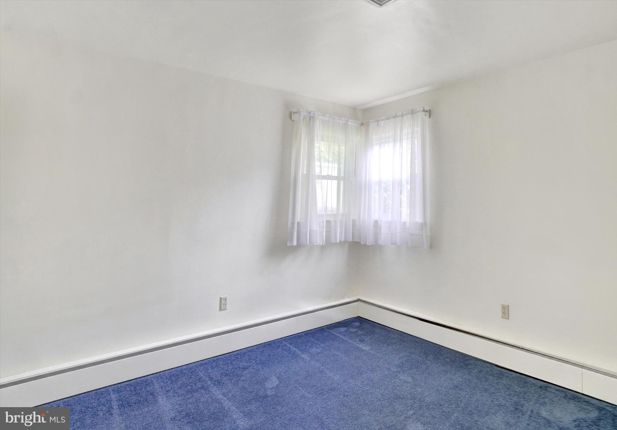 823 Glendale Road York, PA 17403 - Photo 22 of 33 a view of an empty room with a window