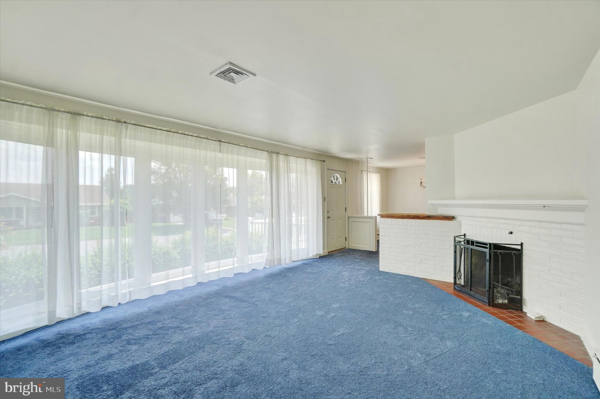 823 Glendale Road York, PA 17403 - Photo 4 of 33 a view of an empty room with a window