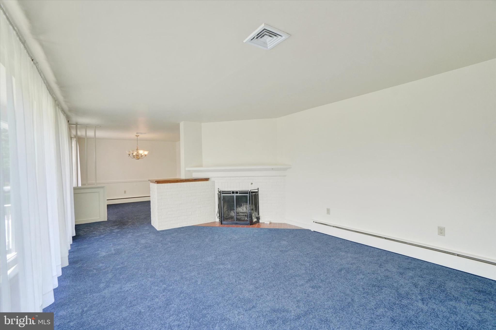 823 Glendale Road York, PA 17403 - Photo 6 of 33 a view of an empty room and fire place