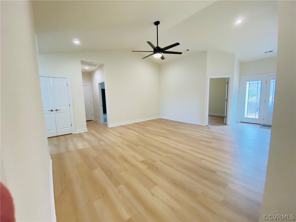 445 New S Ridge Road Bumpass, VA 23024 - Photo 31 of 38 wooden floor in an empty room with a window