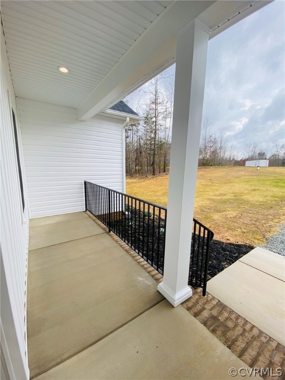 445 New S Ridge Road Bumpass, VA 23024 - Photo 36 of 38 a view of balcony with furniture