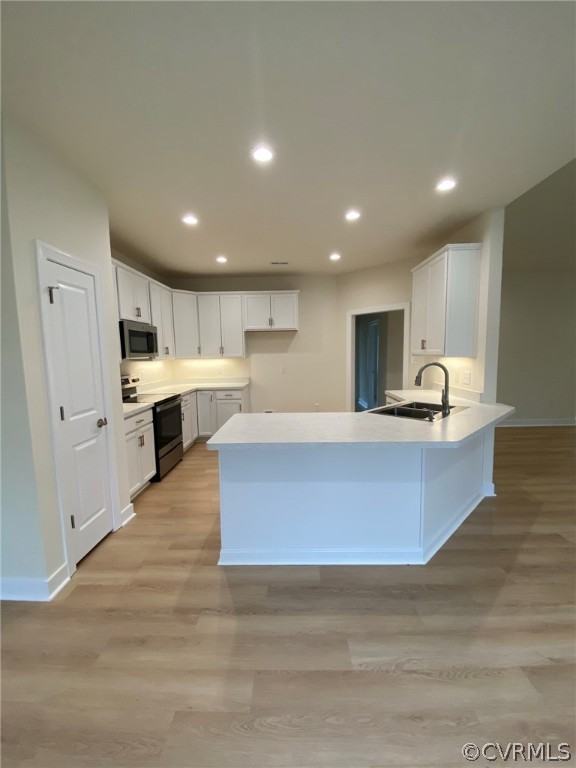 445 New S Ridge Road Bumpass, VA 23024 - Photo 4 of 38 a large kitchen with stainless steel appliances a large counter top