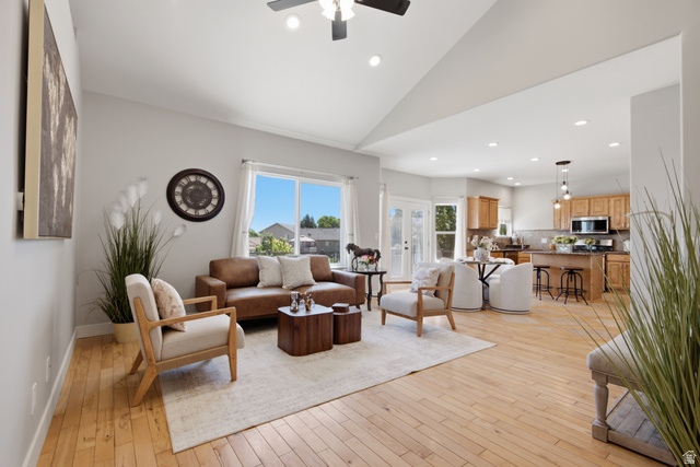1252 Skyline Road Saratoga Springs, UT 84045 - Photo 10 of 51 Vaulted ceiling living area featuring light wood-finish flooring and recessed lighting