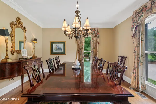 a kitchen with stainless steel appliances a stove and a microwave