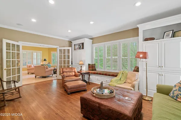 a bath tub sitting in a bathroom next to a window