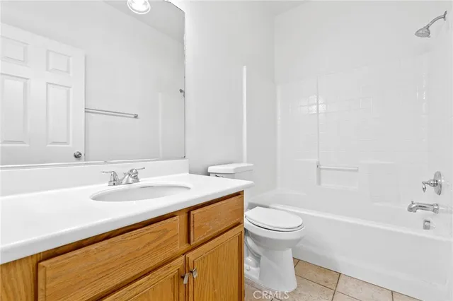 a bathroom with a sink a toilet and a bathtub