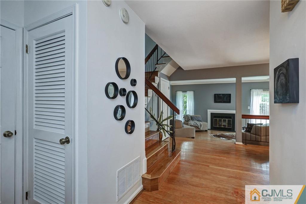 1902 Timber Oaks Road Edison, NJ 08820 - Photo 2 of 22 a view of entryway livingroom and hall with wooden floor