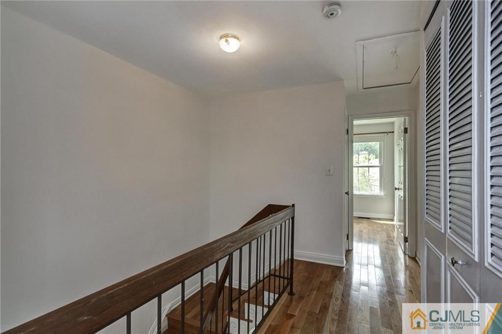 1902 Timber Oaks Road Edison, NJ 08820 - Photo 13 of 22 a view of hallway with wooden floor