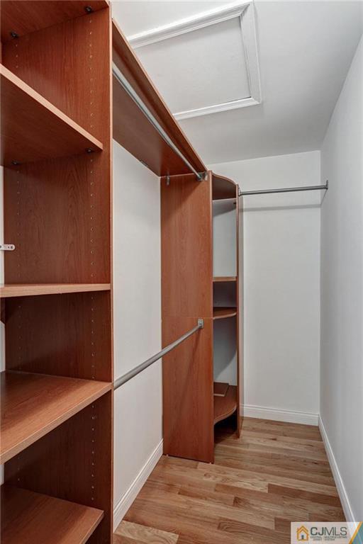 1902 Timber Oaks Road Edison, NJ 08820 - Photo 15 of 22 a view of an empty walk in closet