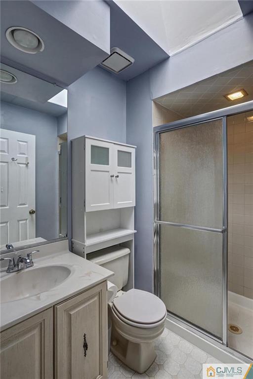 1902 Timber Oaks Road Edison, NJ 08820 - Photo 17 of 22 a bathroom with a granite countertop sink toilet and shower