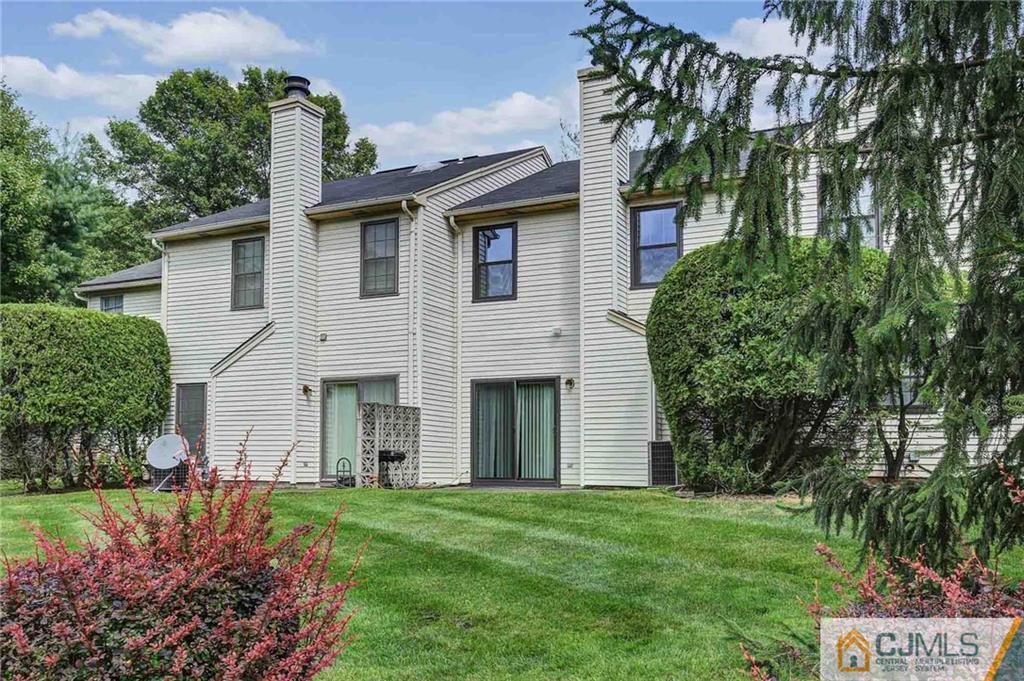1902 Timber Oaks Road Edison, NJ 08820 - Photo 21 of 22 front view of a house with a garden