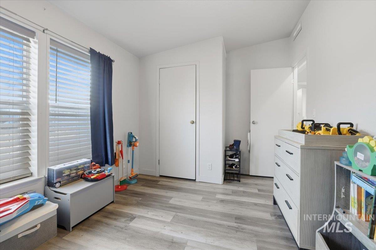 545 South Conover Street Eagle, ID 83616 - Photo 23 of 39 Playroom with light wood finished floors