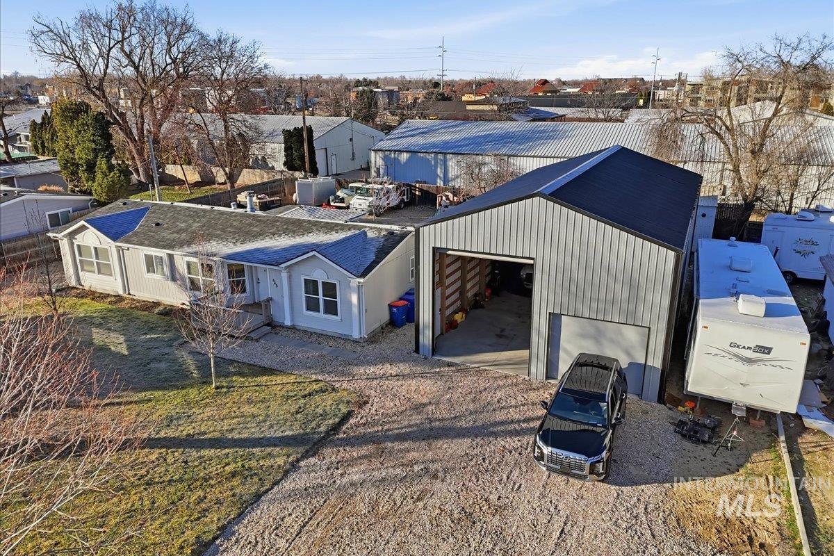 545 South Conover Street Eagle, ID 83616 - Photo 32 of 39 Rear view of property with driveway and a residential view