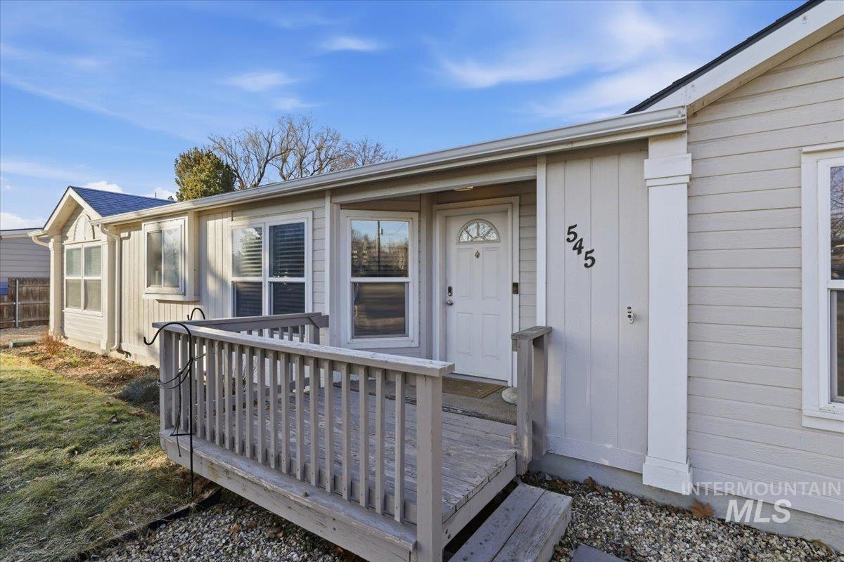 545 South Conover Street Eagle, ID 83616 - Photo 4 of 39 Entrance to property featuring a wooden deck