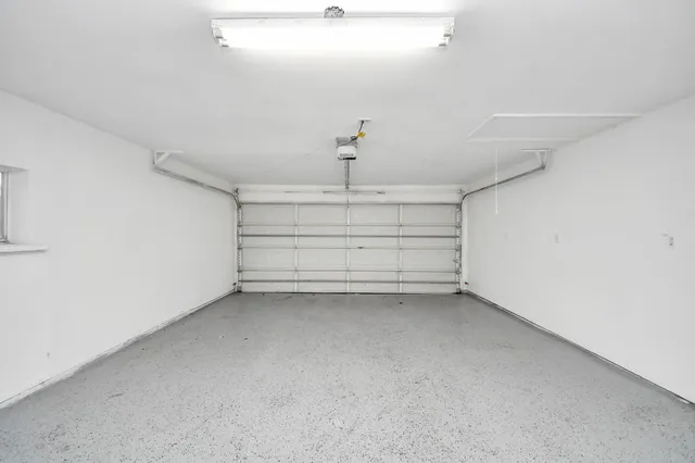 a view of back yard of the house with green space