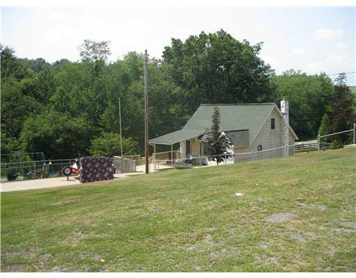 Exterior Front. Charming renovated home & garage on a road that dead ends into Moraine State Park.