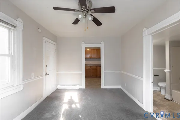 a view of an empty room and window
