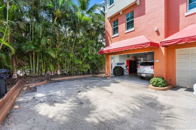 a view of a car park in front of a building