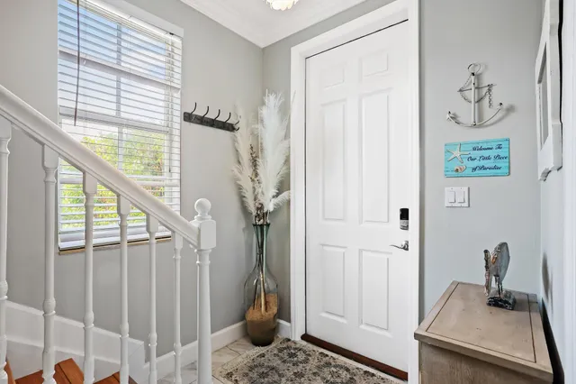 a view of a hallway with a window