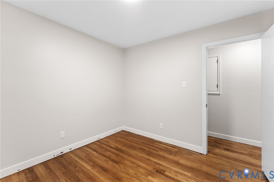 3151 Mountclair Road Chester, VA 23831 - Photo 20 of 36 Spacious room featuring wood-finish flooring, ligh