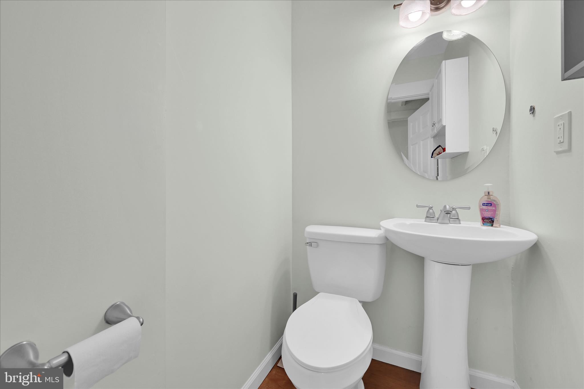 286 Schuylkill Road Birdsboro, PA 19508 - Photo 26 of 39 a bathroom with a toilet a sink and mirror